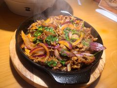 孜然铁板羊肉-九毛九西北菜(汕头金平万达广场店)