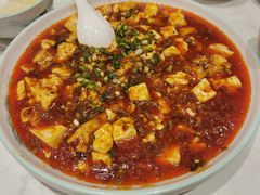 脑花麻婆豆腐-犇逸·乐山跷脚牛肉·四川现炒(览海店)