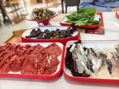 -毛辣果·贵州红酸汤牛肉火锅(西单店)
