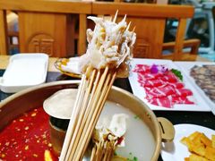 -明何记涮牛肚(品牌首店隋唐植物园南门古城路店)