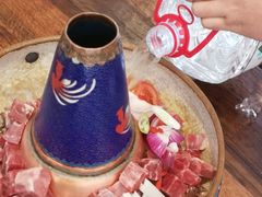 -毛辣果·贵州红酸汤牛肉火锅(西单店)