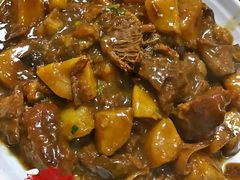 土豆烧牛腩-华春餐馆(鱼山路店)