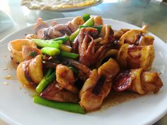 葱爆鱿鱼筒-明记海鲜大排档(巽寮湾店)