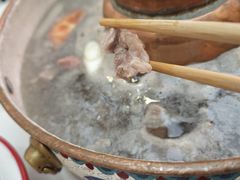 -毛辣果·贵州红酸汤牛肉火锅(西单店)