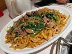 招牌湿炒牛河-潮泰牛肉火锅 · 创于1992年(车公庙店)