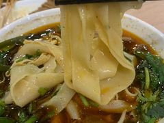 -梁老三麻辣鸡头总店