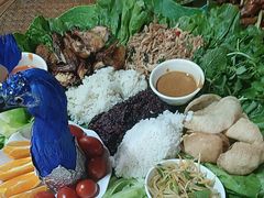 -沐毫傣泐云南菜孔雀宴•手抓饭傣味烧烤(曼听公园店)