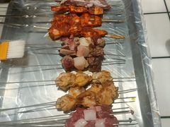 -喜悦小串丹东小黄牛海鲜烧烤大排档(民主广场店)