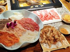 -老牌坊云南鱼豆花火锅(哈西万达店)