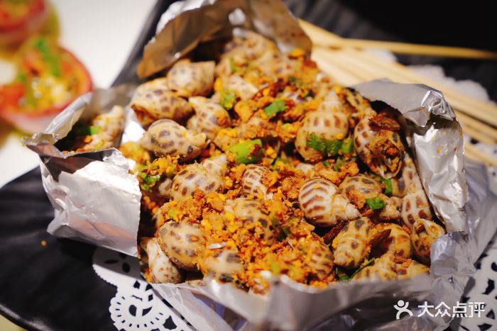 79号渔船海鲜主题饭店(耀中店)盐焗花螺图片