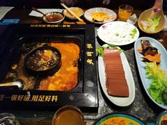-老牌坊云南鱼豆花火锅(哈西万达店)