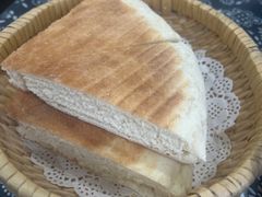 现烙三角饼-八两八金·莱芜特色炒鸡(市南漳浦路店)