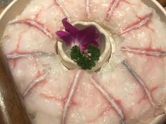 -老牌坊云南鱼豆花火锅(哈西万达店)
