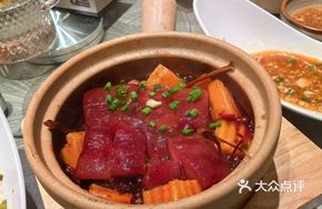 Clay Pot Rice Straw Wrapped Pork