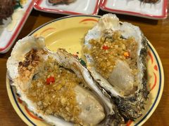 蒜蓉烤乳山生蚝-辉记炭烧海鲜大排档·老字号(福田店)
