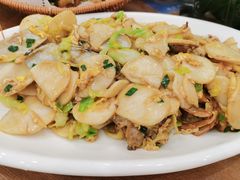 海鲜炒年糕-洲晓鲜·舟山海鲜大排档(朱家尖风景区店)
