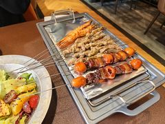 -曼听小寨海鲜烧烤·大连辣炒大王(盖州街店)