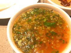 番茄汤加牛肉粒-海底捞火锅(万达坊店)