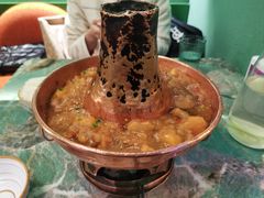 土司铜锅油焖鸡-浩海火烧云傣家菜(京广店)
