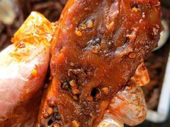 麻辣鸭头-休记光头香辣蟹干锅(绵竹店)