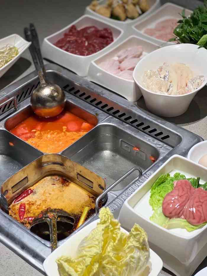 海底捞火锅(万州万达店)-"跟朋友昨晚晚上从东莞到重庆这边,过来也不.