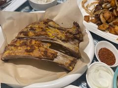 馕坑果木烤羊排-巴扎美食·新疆菜·西域歌舞表演餐厅(新疆大厦店)