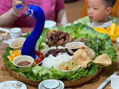 -沐毫傣泐云南菜孔雀宴•手抓饭傣味烧烤(曼听公园店)
