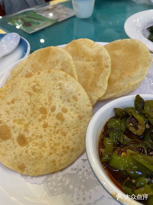 国强手抓(北京西路店)烫面油香图片