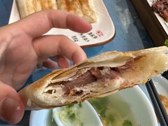 -乔家小院•非遗驴肉•青岛菜(滨河路店)
