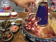 -毛辣果·贵州红酸汤牛肉火锅(西单店)