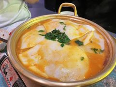 牛牛霸鸡脚煲-浩海火燒雲傣家菜(芮欧百货店)