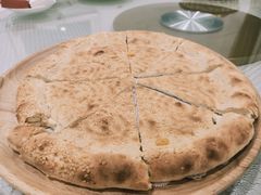 馕坑芝麻馕-巴扎美食·新疆菜·西域歌舞表演餐厅(新疆大厦店)