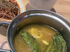 酸萝卜鸭汤锅-龙聚德北京烤鸭(沙坪坝华宇A馆店)