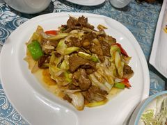 葱爆羊羔肉-巴扎美食·新疆菜·西域歌舞表演餐厅(新疆大厦店)