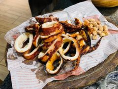 铁板香辣鱿鱼-草家酱蟹炭火烤肉店(珲春南路一店)