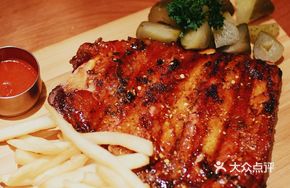 Grilled Spanish Pork Ribs with Fries and Pickled Cucumber