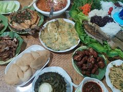 -沐毫傣泐云南菜孔雀宴•手抓饭傣味烧烤(曼听公园店)