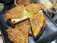 烤饼-明何记涮牛肚(品牌首店隋唐植物园南门古城路店)