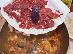 -毛辣果·贵州红酸汤牛肉火锅(西单店)