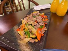 酸木瓜炒牛肉-紫滇源云南生态菜(丹凤街店)
