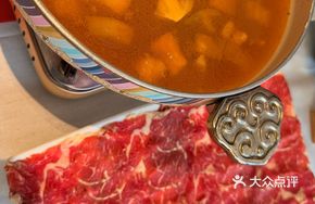 Yellow Tomato Sour Soup with Tender Beef Slice