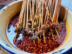 -拈签一笑黄牛肉辣卤串串