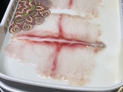 -老牌坊云南鱼豆花火锅(哈西万达店)
