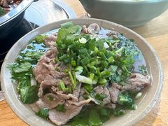 翘脚牛肉-大众跷脚牛肉馆·非遗传承单位(峨眉山店)