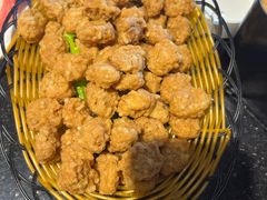 -明何记涮牛肚(品牌首店隋唐植物园南门古城路店)