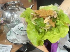 -沐毫傣泐云南菜孔雀宴•手抓饭傣味烧烤(曼听公园店)