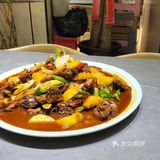 说到域上疆山餐厅，怎能不提它的招牌菜— 【馕包肉】呢