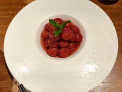 酒渍小番茄-金手鼓·新疆菜(南京店)