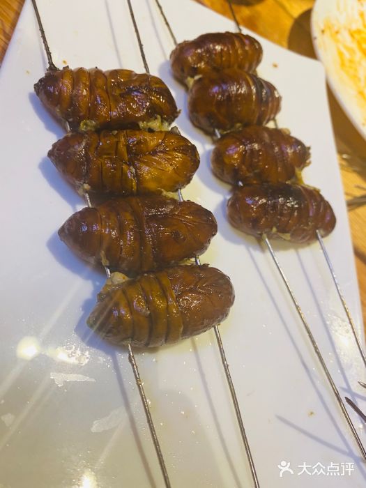 老万烧烤(典逸心洲店)烤蚕蛹图片