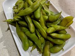 凉拌毛豆-墨脱石锅椰子鸡•香草鸭•东山羊(大东海店)